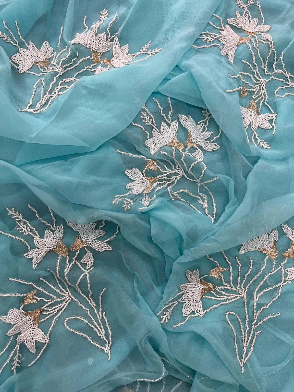Aqua pearl Zari buta saree