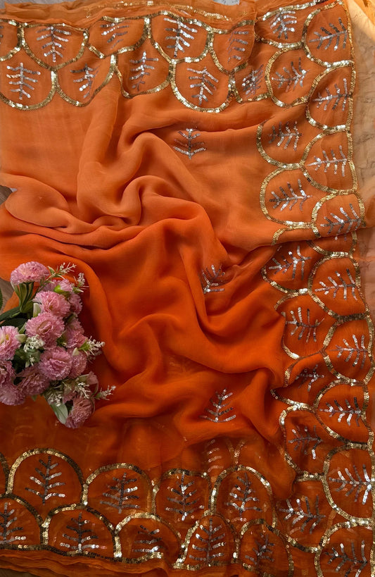 Orange shaded sequins border saree