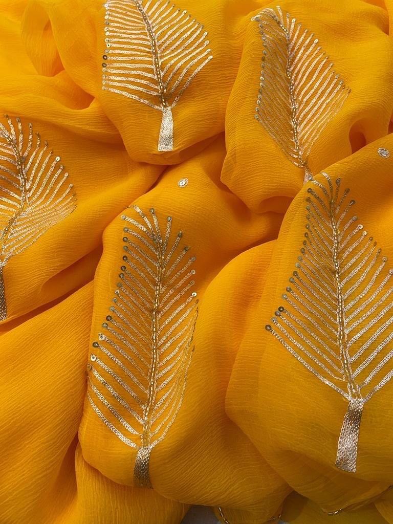 Yellow Aari buta saree