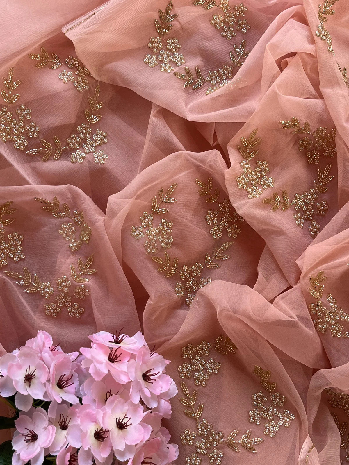 Peach cutdana motif saree