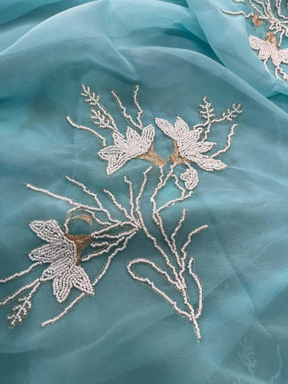 Aqua pearl Zari buta saree