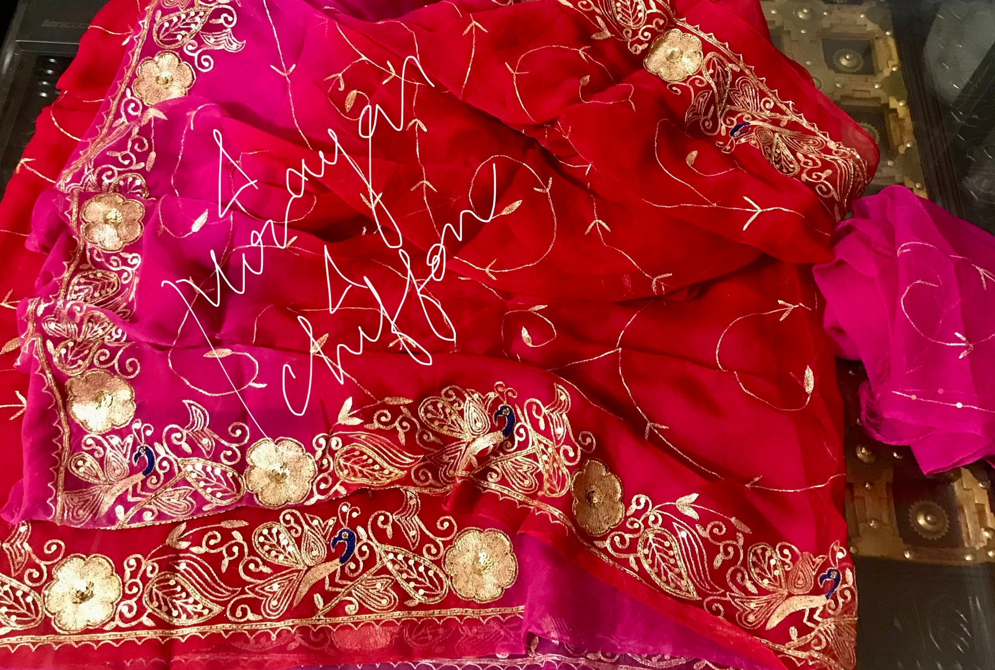 Red Shaded Peacock Aari Border With Jaal Miraya Chiffon Sarees