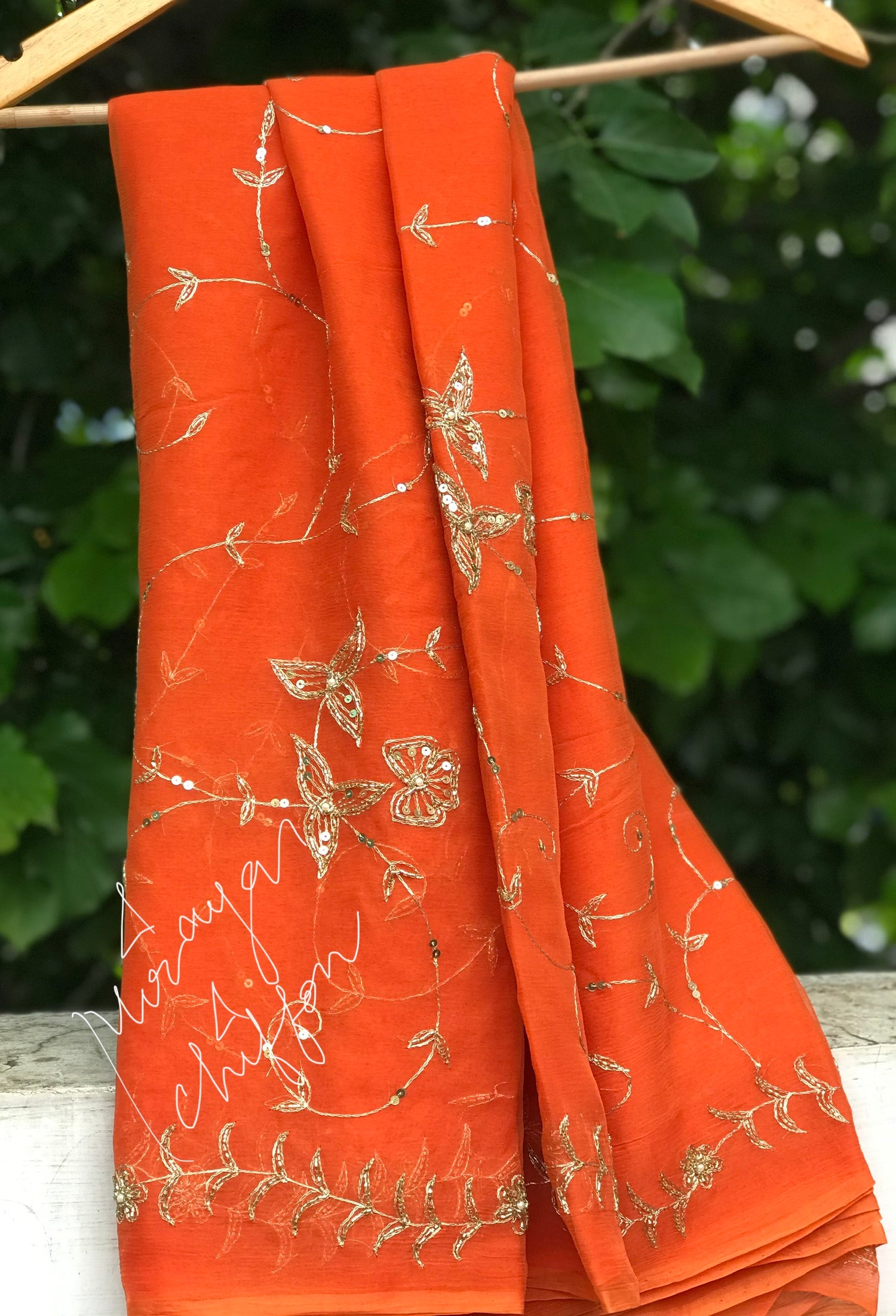 Orange Aari Cutdana sequin Jaal Miraya Chiffon Sarees