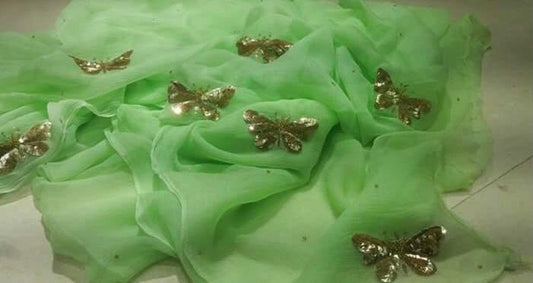 Golden sequins butterfly motifs