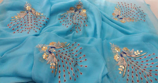 Sky blue peacock motifs