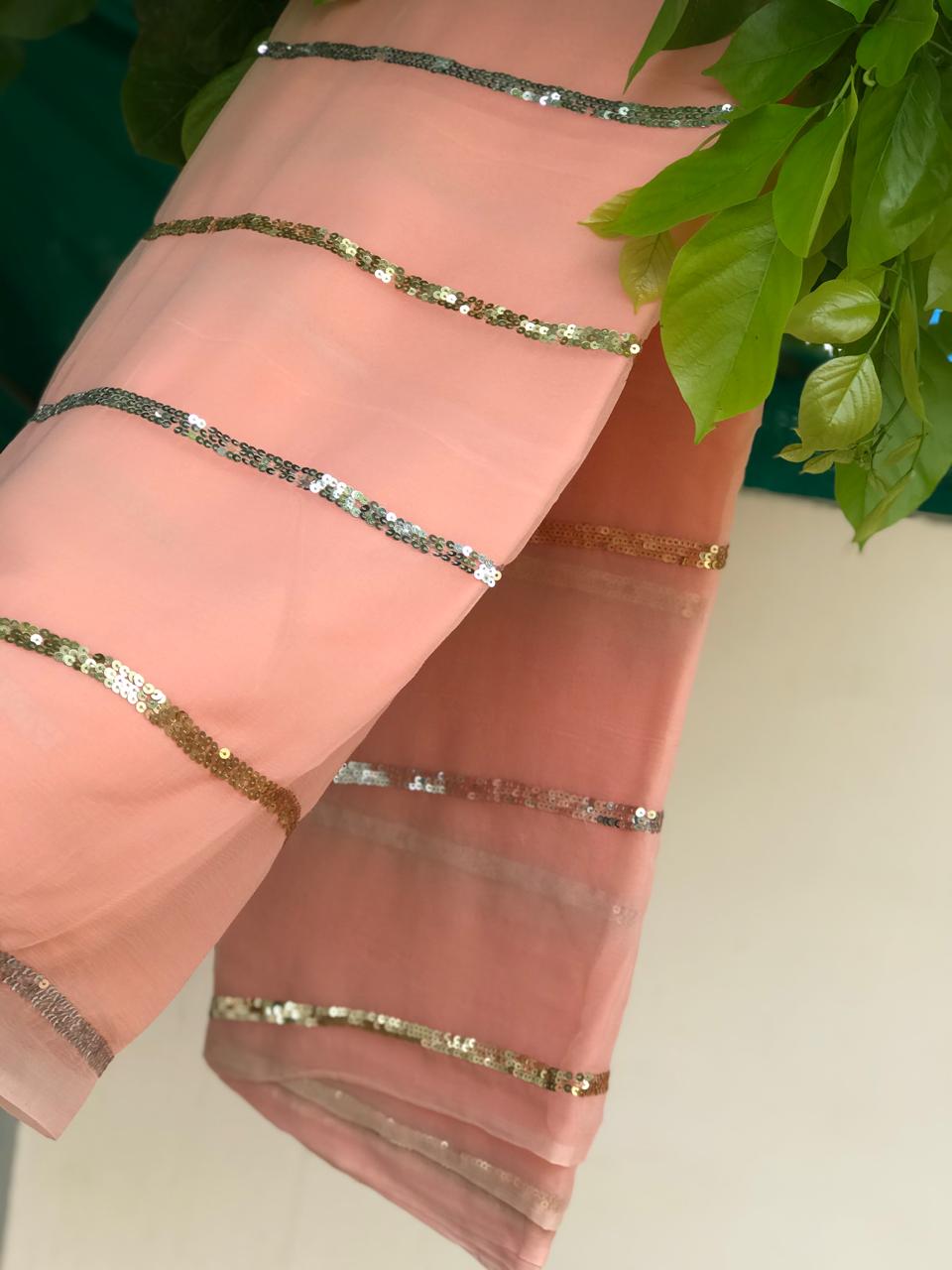 Peach golden silver sequins saree